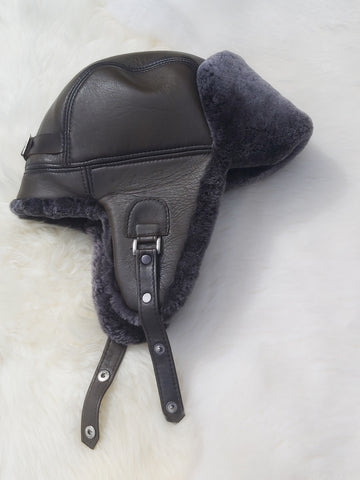 Olív zöld színű, kézműves uniszex szőrme usánka